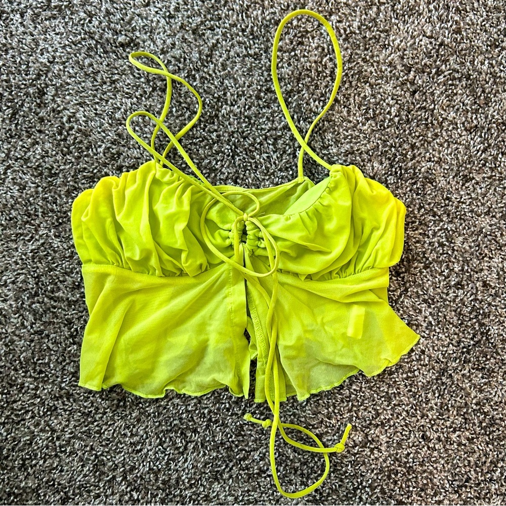 Light yellow green going out ruffle split hem top